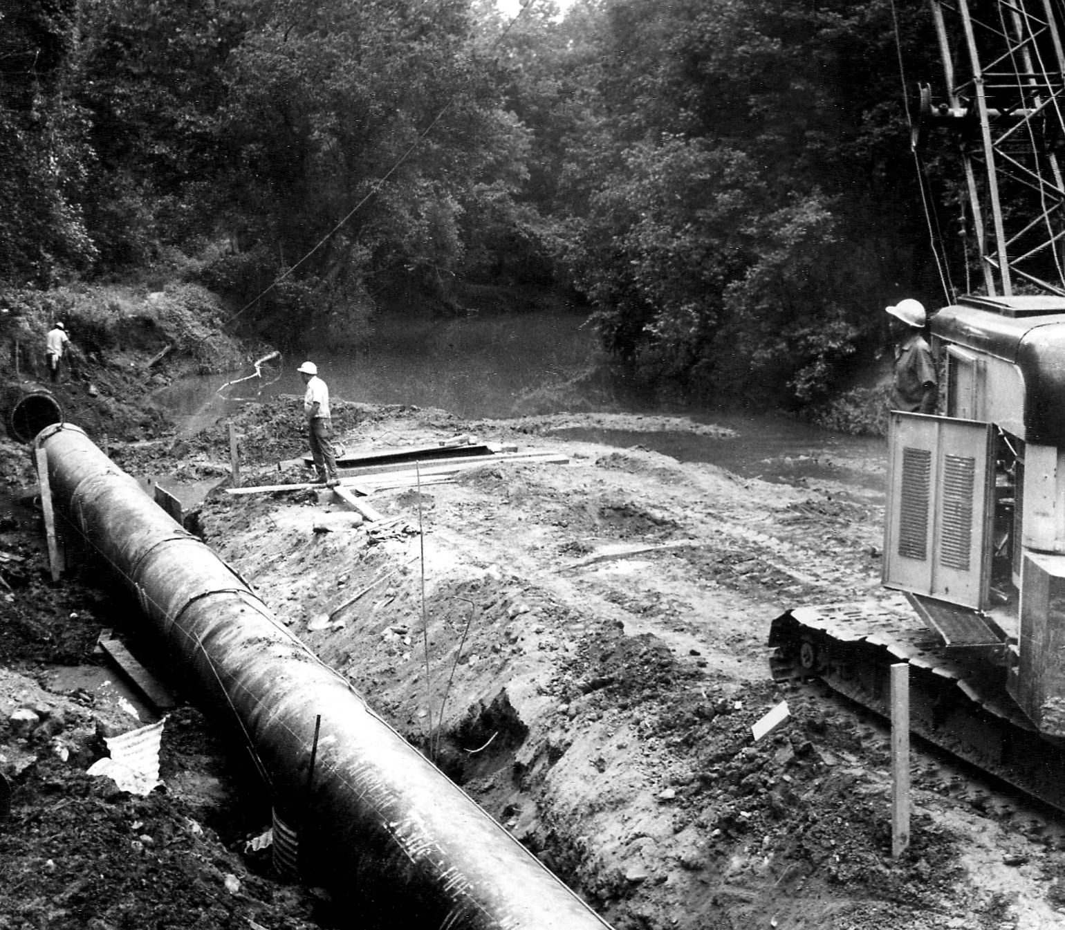 July 29, 1972 Replacing pipe lost in flood
